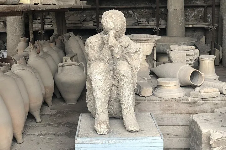 Pompeii - Plaster cast of a citizen who died suffocated by the toxic gases due to the eruption of Mt Vesuvius of 79 AD